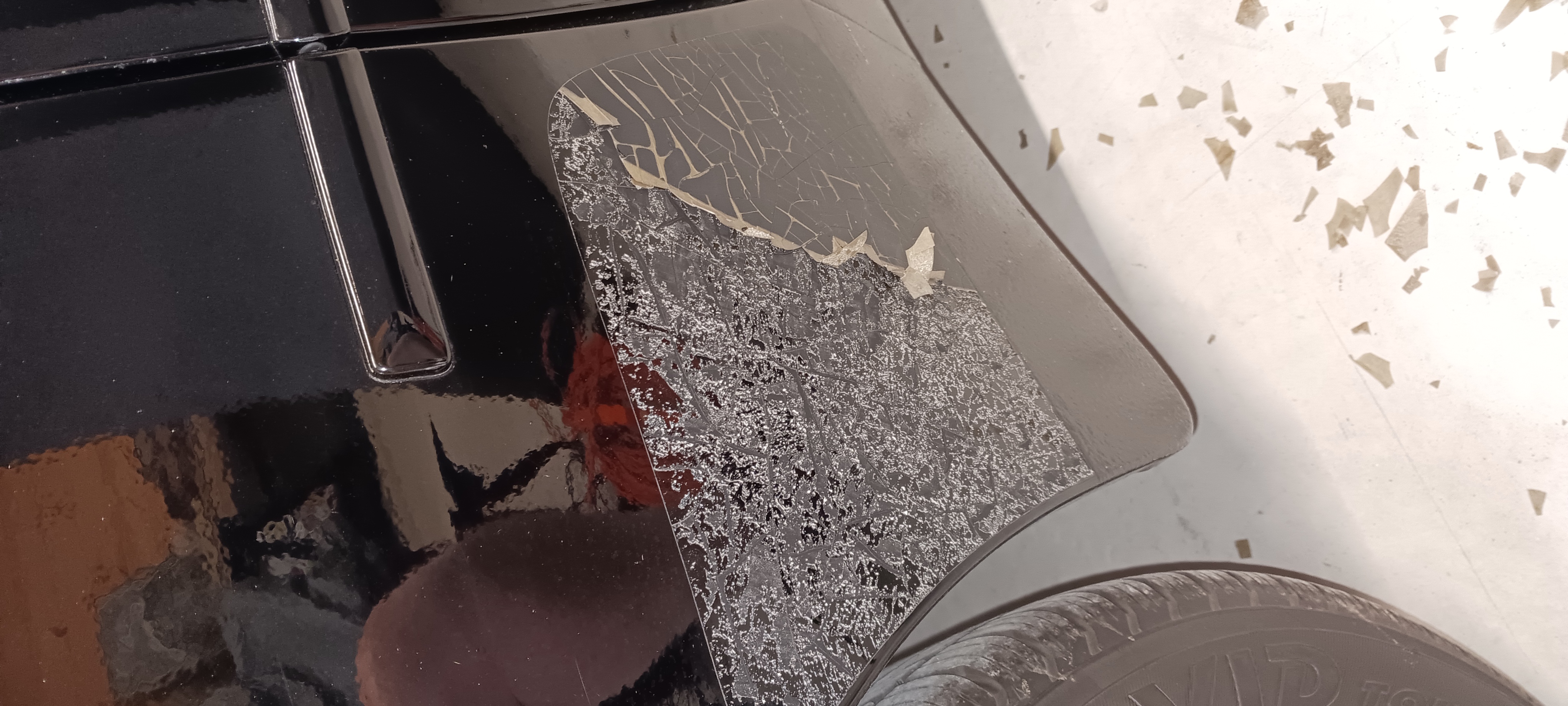 Scraping guard leaving adhesive