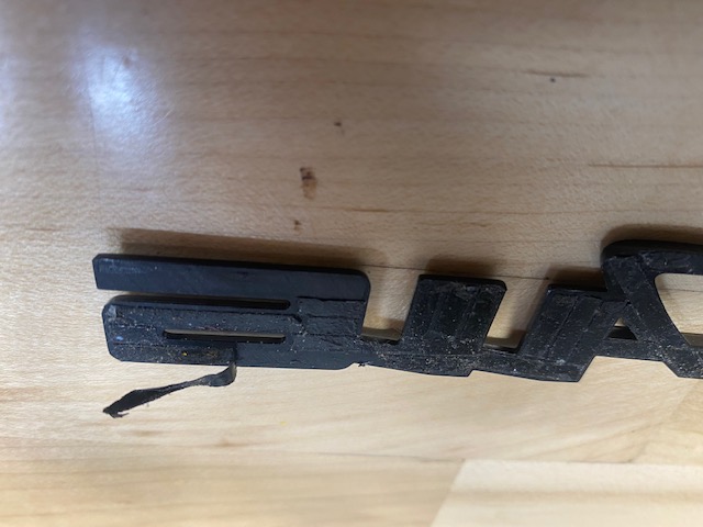 tape on badge.jpg