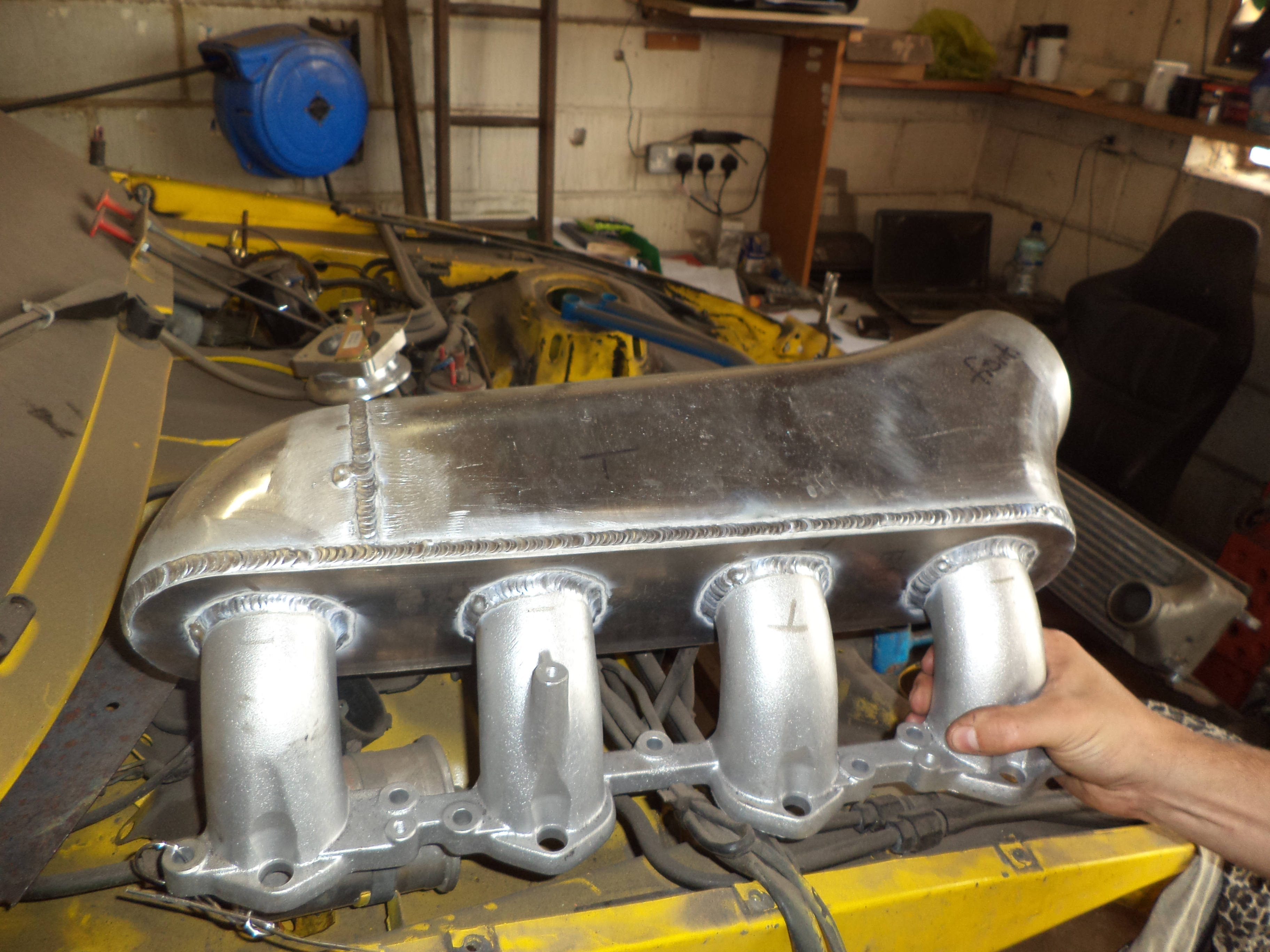 manifold and bracket 001.JPG