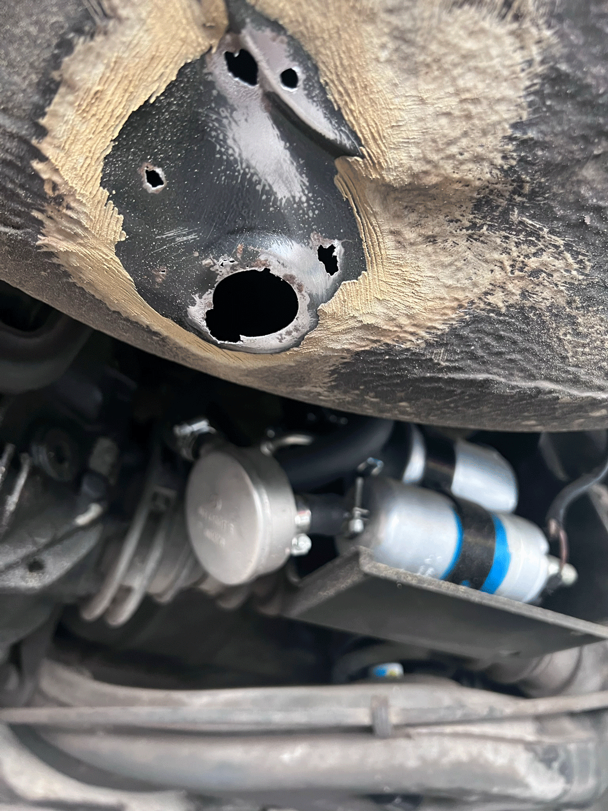rust-holes-2.gif