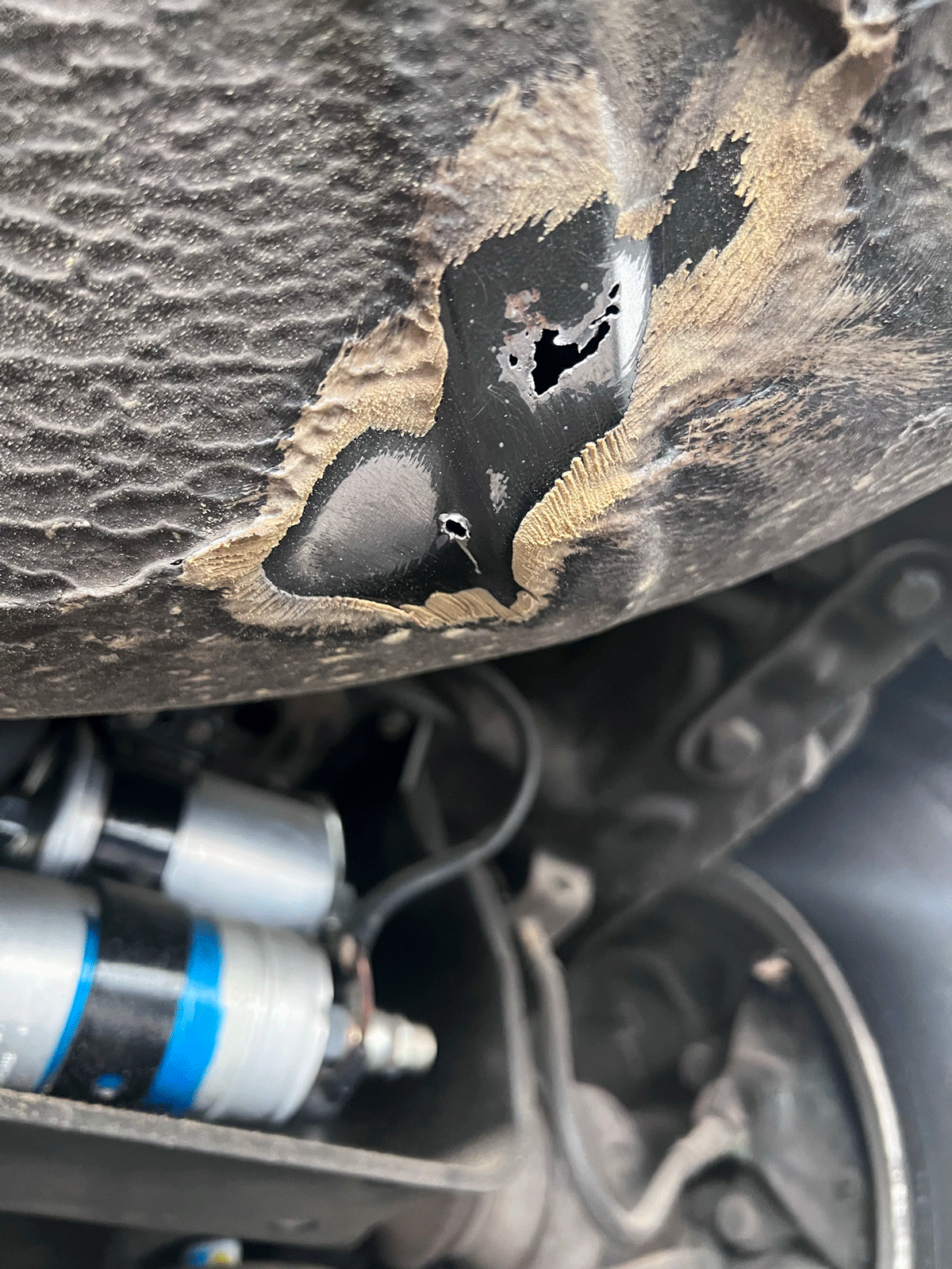 rust-holes-1.gif